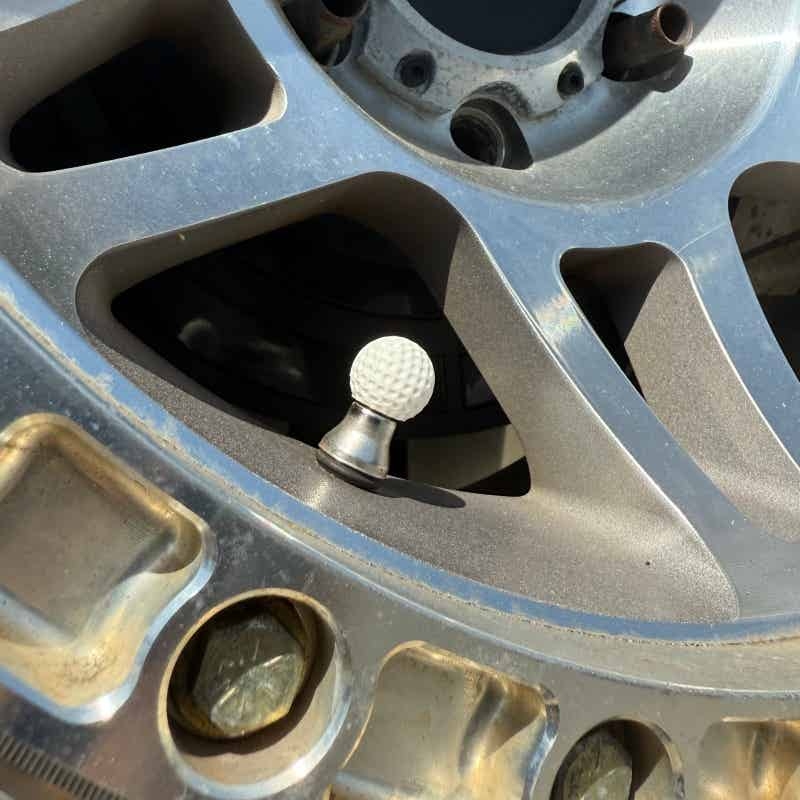Steering Wheel Cover - Golf Ball Style Tire Valve Stem